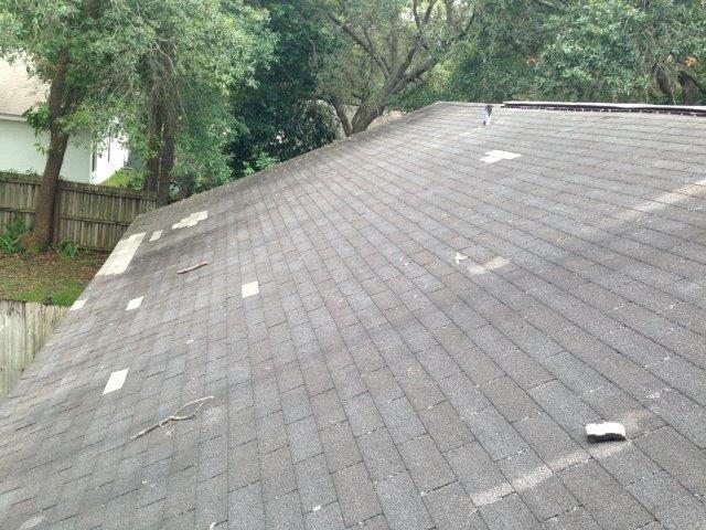 Shingle tile roofing in need of repair